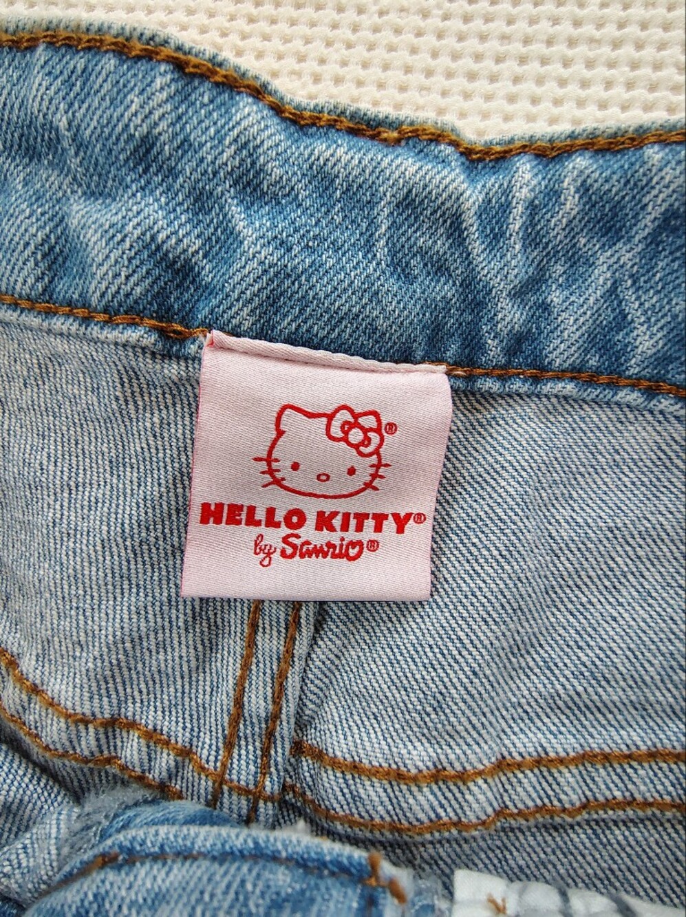 Hello Kitty Light Blue High-Rise Jeans with Red Bow Appliqués - Picture 10 of 15